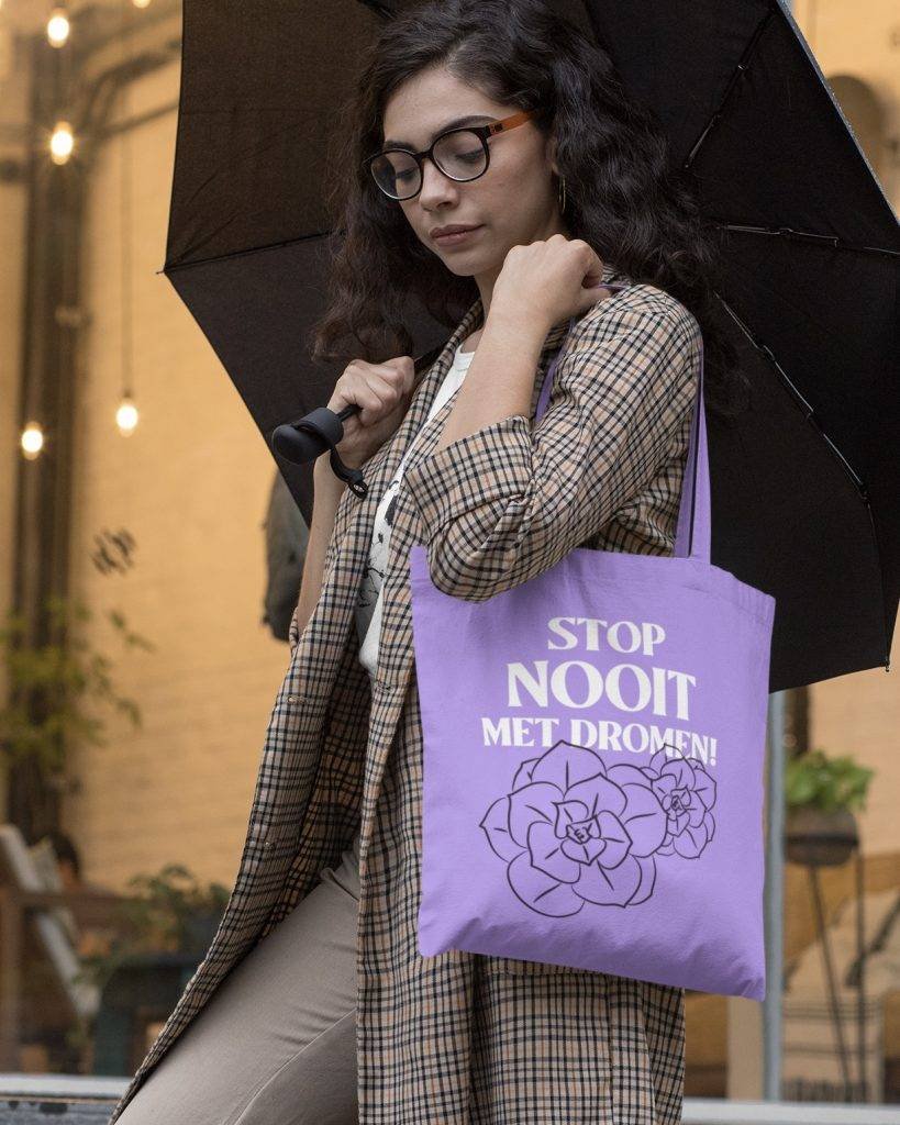 mockup of a fancy woman carrying a tote bag on a rainy afternoon 29456