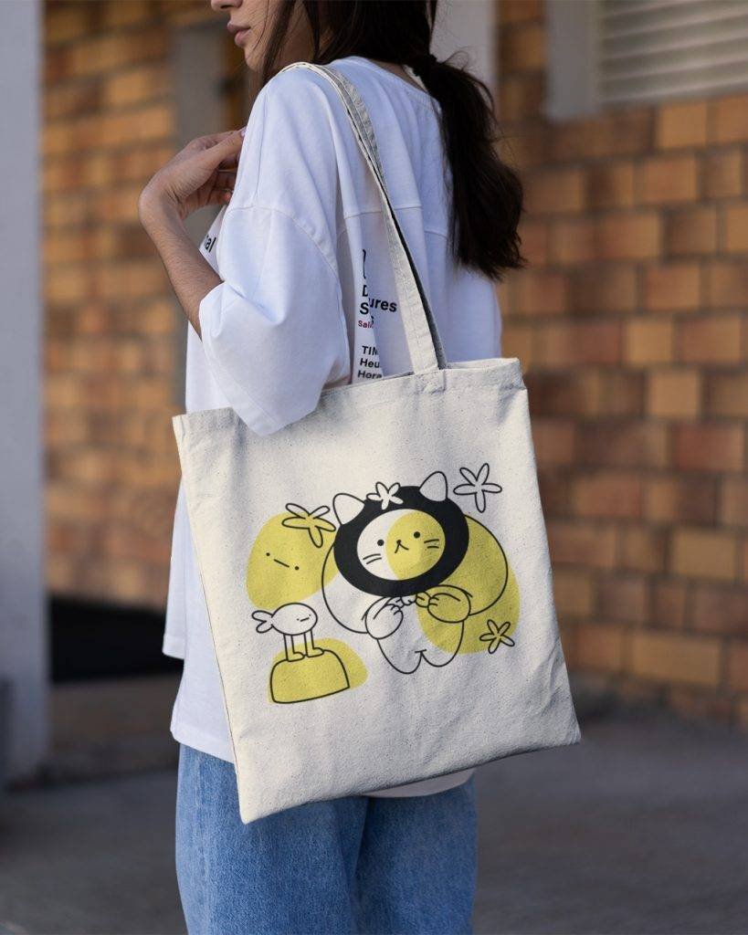 mockup of a woman with a tote bag walking on a hallway 3133 el1